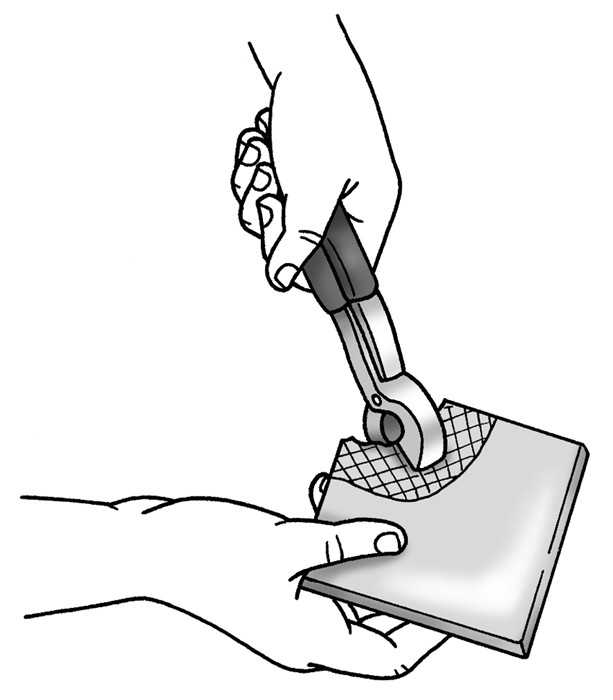 Figure 3-9: Remove small pieces of tile with a tile nipper.